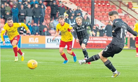  ?? Pictures: Getty Images. ?? Kevin Nisbet scores one of his two penalties – and four goals in total – against Partick.