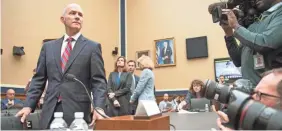  ??  ?? Former Equifax CEO Richard Smith prepares to testify before a House panel about the massive data breach in October. JACK GRUBER/USA TODAY