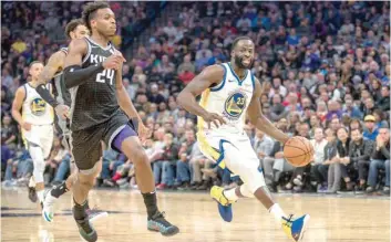  ?? — USA Today Sports ?? Golden State Warriors forward Draymond Green (23) pushes the ball up the court during the second quarter against the Sacramento Kings at Golden 1 Center.