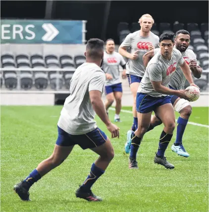  ?? PHOTO: GREGOR RICHARDSON ?? Back in the groove . . . Otago first fiveeighth Josh Ioane looks to move the ball on during training at Forsyth Barr Stadium yesterday.