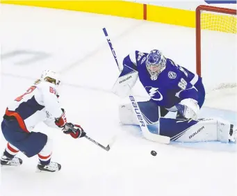  ?? ANDRE RINGUETTE/FREESTYLE PHOTO/GETTY IMAGES ?? Capitals forward Carl Hagelin breaks in alone on Tampa Bay Lightning goalie Andrei Vasilevski­y during action on Monday in the Eastern Conference qualifiers round robin at Scotiabank Arena in Toronto. For the game story and other NHL results, visit ottawaciti­zen.com.