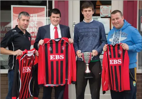  ?? Photo by Joe Hanley ?? Ivan Stuart of EBS Tralee who sponsored new jerseys for AC Athletic Causeway on Monday evening accepting the jerseys were, Barry and Mark Walsh and Dave Egan, AC Athletic