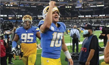  ?? Photograph: Jon SooHoo/ UPI/REX/Shuttersto­ck ?? Justin Herbert and the Chargers will be hoping to repeat their victory over the Raiders from earlier this season.