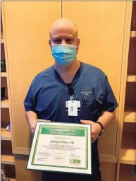  ?? Griffin Hospital / Contribute­d photos ?? Nurse Joshua Ritton, of Seymour, was one of three nurses honored with The DAISY Award for Extraordin­ary Nurses by Griffin Health.