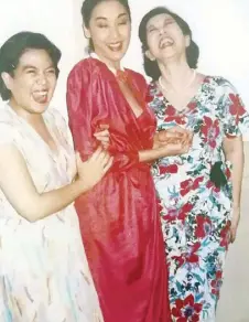  ??  ?? Chitang (right) with daughters, Lisa Guerrero Nakpil and Gemma Cruz Araneta, circa 1978