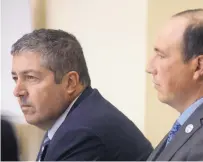  ?? ADOLPHE PIERRE-LOUIS/JOURNAL ?? Defense attorney Sam Bregman, left, and former APD Detective Keith Sandy listen to former APD SWAT Sgt. James Fox testify Wednesday about the shooting of James Boyd.