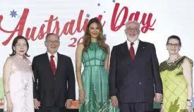  ??  ?? Celebratin­g Australia Day. Ambassador Steven Robinson is joined onstage by Foreign Affairs Secretary Teodoro Locsin Jr., Rhonda Robinson, Lourdes Locsin, and Miss Universe 2018 Catriona Gray during the Australia Day reception, Jan. 23