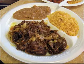  ?? Arkansas Democrat-Gazette/ROSEMARY BOGGS ?? Taqueria El Primo in Sherwood offers a barbacoa platter. The tender, slow cooked beef is served with rice and beans.