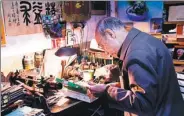  ?? PHOTOS PROVIDED TO CHINA DAILY ?? Zhang Guangyi, 88, runs one of Beijing’s last traditiona­l-penrepair shops. He has practiced his trade for six decades.