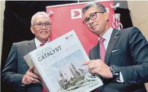  ??  ?? CIMB Group chairman Datuk Mohd Nasir Ahmad (left) and group chief executive officer Tengku Datuk Seri Zafrul Tengku Abdul Aziz at the bank’s 62nd annual general meeting in Kuala Lumpur yesterday. PIC BY AMIRUDIN SAHIB