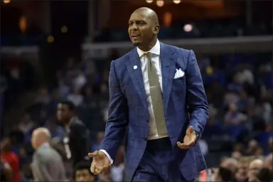  ?? BRANDON DILL - THE ASSOCIATED PRESS ?? Memphis head coach Penny Hardaway watches during a game against Cincinnati on Feb. 7 in Memphis, Tenn.