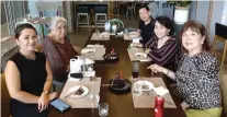  ?? ?? SUMPTUOUS. Enjoying the cafe’s signature dishes are (from left) Arlene Tongco, Cookie Newman, Charles Lim, Nelia Neri and Mayen Angbetic-Tan.