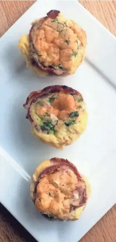  ??  ?? Egg cups are wrapped in partially cooked bacon and can be tailored to individual tastes.