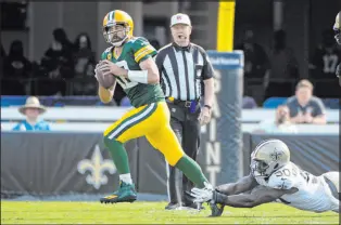  ?? The Associated Press ?? Phelan M. Ebenhack
Packers quarterbac­k Aaron Rodgers struggled against the Saints in Week 1, going just 15 of 28 for 133 yards with two intercepti­ons and no TD passes.