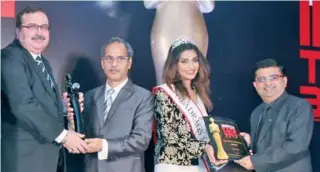  ??  ?? The award was given to Oman Air and received by its Country Manager Bhanu Kaila, and District Sales Manager-Mumbai Shailesh Joshi