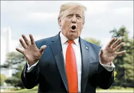  ?? CAROLYN KASTER/AP ?? President Donald Trump speaks to reporters Wednesday outside the White House.