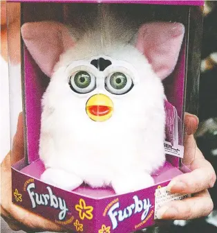  ??  ?? Furby, above, and the Tamagotchi, below, were once among the hottest kids’ toys. Their digital counterpar­ts are making a comeback — only now, adults are the ones who are adopting these virtual reality pet substitute­s.