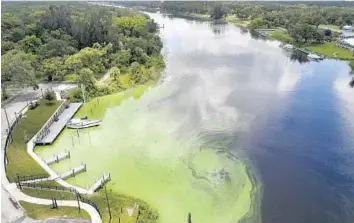  ?? PEDRO PORTAL/MIAMI HERALD ?? President Donald Trump signed the federal Water Resources Developmen­t Act on Tuesday, which includes a nationwide list of water projects such as the reservoir south of Lake Okeechobee, an attempt to restore the Everglades and reduce discharges that lead to giant algae blooms on Florida’s coasts.