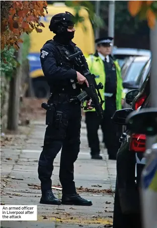  ?? ?? An armed officer in Liverpool after the attack