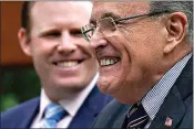  ?? York. (AP Photo/Mary Altaffer) ?? Andrew Giuliani, a Republican candidate for Governor of New York, left, is joined by his father former New York City mayor Rudy Giuliani during a news conference, Tuesday, June 7, 2022, in New