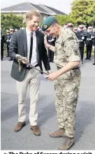  ?? Chris Jackson/Press Associatio­n ?? > The Duke of Sussex during a visit to the Royal Marines Commando Training Centre in Lympstone in 2018