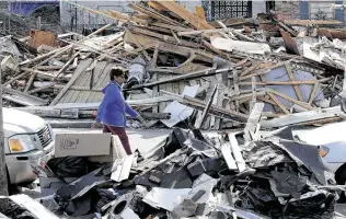  ?? Mark Humphrey / Associated Press ?? North Nashville, a heavily African-American neighborho­od, was already struggling with decades of redlining and neglect before a series of deadly tornadoes clobbered middle Tennessee.