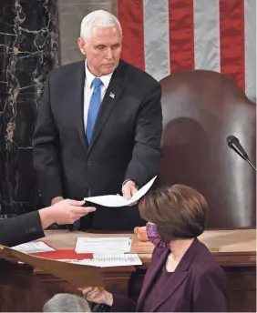  ?? POOL/GETTY IMAGES ?? Vice President Mike Pence presides over a joint session of Congress on Jan. 6 to confirm Joe Biden’s win in the presidenti­al election.