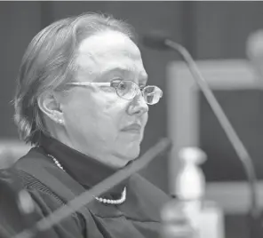  ?? MAX GERSH/THE COMMERCIAL APPEAL ?? Judge Paula Skahan listens to arguments in 2019 during a hearing at the Shelby County courthouse in Memphis.