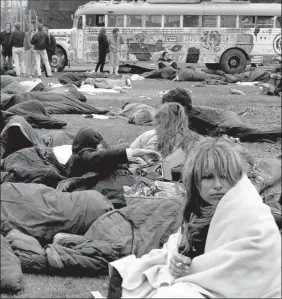  ?? MONTEREY HERALD VIA AP ?? This June 17, 1967, photo shows the football field at Monterey Peninsula College where more than 20,000 people camped during the Monterey Pop Festival in Monterey, Calif. Before Burning Man and Bonnaroo, Coachella and Lollapaloo­za, Glastonbur­y and...