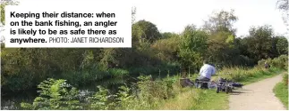  ?? PHOTO: JANET RICHARDSON ?? Keeping their distance: when on the bank fishing, an angler is likely to be as safe there as anywhere.