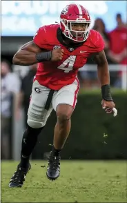  ?? ?? Georgia linebacker Nolan Smith (4) plays during the second half against Kentucky, Oct. 16, in Athens, Ga. Georgia will play Alabama in an all-Southeaste­rn Conference College Football Playoff national championsh­ip on Monday.