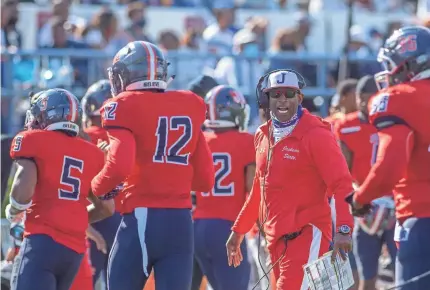  ?? BARBARA GAUNTT/THE CLARION LEDGER ?? Jackson State first-year coach Deion Sanders shouts directions to his players during their April 3 home football game against Southern.