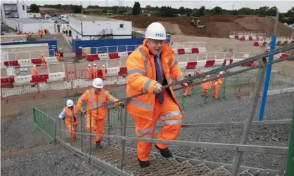  ?? Photograph: WPA/Getty Images ?? ‘Boris Johnson cannot resist being photograph­ed on building sites.’ The prime minister visitingth­e HS2 Solihull interchang­e, 4 September 2020.