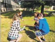  ?? Robin Ledversis / Contribute­d photo ?? Freshmen participat­e in a team-building exercise Thursday at Torrington High School on orientatio­n day.