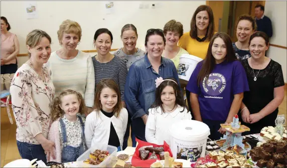  ??  ?? Pictured at the coffee morning for the Martin Family Trust at Roundwood Parish Centre: back - Cleo Fanning, Mary Fox, Brenda Halligan, Mandy Halligan, Sinead Brady, Catherine Connolly, Mary Carstairs, Sue Gaskin; front - Saoirse Fanning, Hannah Fox, Rosie Kelly, Valerie Halligan, Adrienne Gaskin.