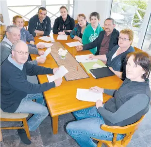  ??  ?? Lardner residents (from left) Russell Bell, John Kinrade, Lorraine Kinrade, John Ercoles, Suzanne Ercoles, Jo Rankin, Daryl Storey, Geoff Storey, Helen Case and Sandra Bell are concerned about noise from the festival.