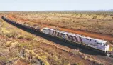  ?? Picture: CHRISTIAN SPROGOE PHOTOGRAPH­Y ?? MONSTER LOCOMOTIVE: Super-size train operating in the Pilbara in WA.