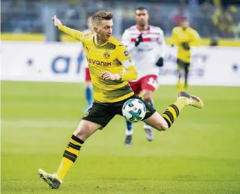  ?? FOTO: IMAGO ?? Die Körperspan­nung stimmt: Marco Reus im Bundesliga­spiel gegen den HSV.