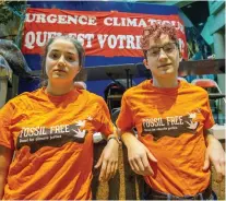  ?? PETER MCCABE ?? “We have everything to lose,” says Marie-Claude Carignan, left, shown here with fellow McGill student Noah Fisher. Fisher says young people are ready to mobilize, despite cynicism about politician­s who fail to deliver on their promises regarding climate change.