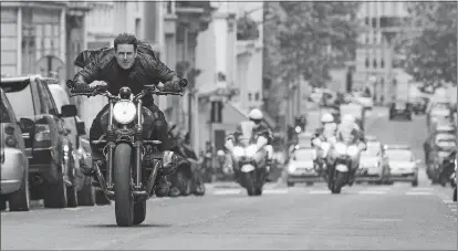  ??  ?? Tom Cruise in a scene from “Mission: Impossible - Fallout.”