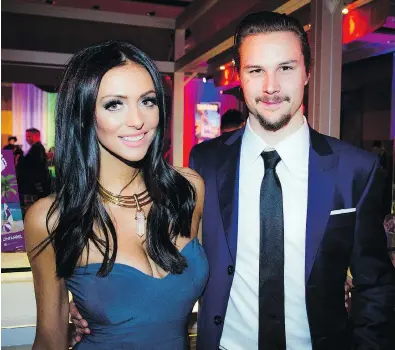  ?? ASHLEY FRASER / POSTMEDIA NEWS ?? Melinda Karlsson, with husband, Ottawa Senators captain Erik Karlsson, alleges that the fiancée of Senators forward Mike Hoffman harassed her online as she dealt with the still birth of her son last March.