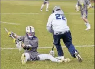  ?? STAN HUDY - SHUDY@DIGITALFIR­STMEDIA.COM ?? Ballston Spa long pole Connor Cecala (ground) doesn’t give up on a ground ball, shuffling if off before Saratoga’s Malcom Smack can regain possession Thursday afternoon behind Saratoga Springs High School.