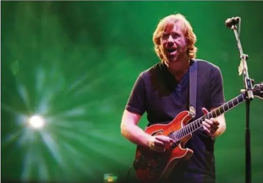  ?? ASSOCIATED PRESS ?? In this 2009photo provided by Fuse TV via Starpix, Trey Anastasio of the “Jam Band” Phish performs at Bonaroo 2009, in Manchester Tenn.