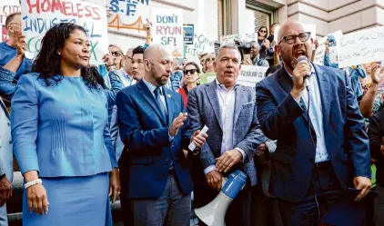  ?? Jessica Christian/The Chronicle ?? From left, San Francisco Mayor London Breed, Supervisor­s Joel Engardio, Matt Dorsey and Rafael Mandelman participat­e in a rally on Aug. 23 outside the 9th Circuit Court of Appeals in San Francisco demanding the court overturn an injunction prohibitin­g the city from sweeping homeless encampment­s.