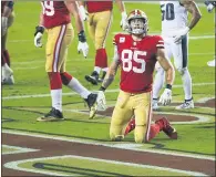  ?? RANDY VAZQUEZ — BAY AREA NEWS GROUP ?? The 49ers’ George Kittle looks up at the big screen after failing to catch a two-point conversion versus the Eagles at Levi’s Stadium in Santa Clara on Sunday.