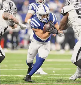  ?? Andy Lyons/Tribune News Services ?? The Colts have benefited from former rushing champion Jonathan Taylor appearing to have hit his stride after battling injuries before and during the season.