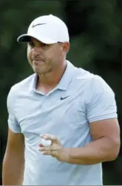  ?? CHARLIE RIEDEL — THE ASSOCIATED PRESS ?? Brooks Koepka reacts after a birdie on the 17th green during the third round of the PGA Championsh­ip at Bellerive Country Club on Aug. 11 in St. Louis.