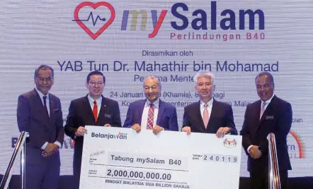  ??  ?? Prime Minister Tun dr Mahathir Mohamad launching the Mysalam scheme in Putrajaya in January. With him are (from left) health Minister datuk seri dzulkefly ahmad, Lim, Great Eastern Life holdings Limited group chief executive Khor hock seng and deputy Finance Minister datuk amiruddin hamzah.