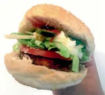  ?? THOMAS HEATON/STUFF ?? This is what we think the Mcvegan is, with a tofu patty. Don’t forget the pickles.