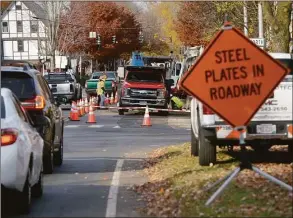  ?? H John Voorhees III / Hearst Connecticu­t Media file photo ?? Utility crews complete work on Main Street between Governor and Prospect on Nov. 17 in Ridgefield.